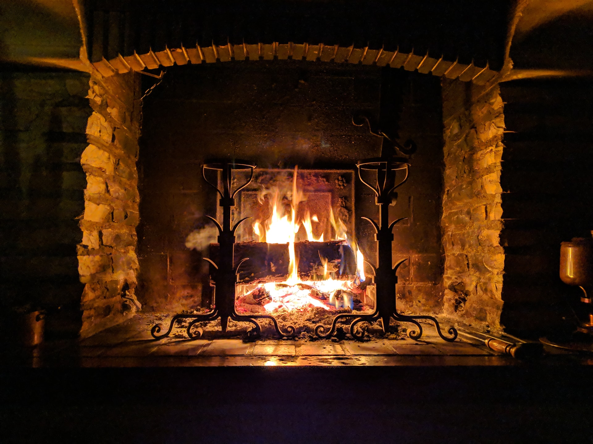 Burning Fireplace with Stone Surrounding